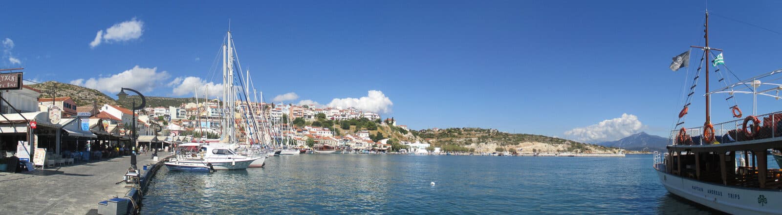 Pythagoreio harbour on Samos, with whitewashed houses and fishing boats